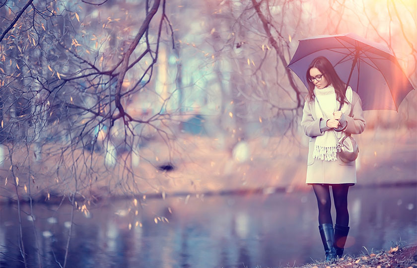 woman walking with an umbrella